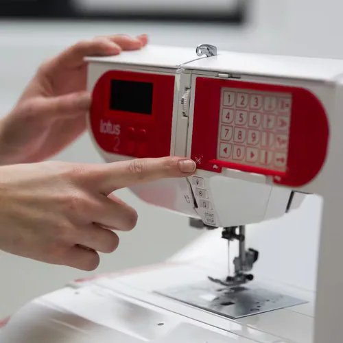 Elna Lotus 2 sewing machine buttons controls