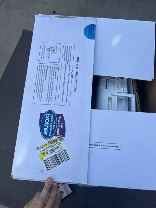 Unboxing a Brother SE700 Sewing and Embroidery Machine—view of the still-boxed unit inside its original Brother packaging.