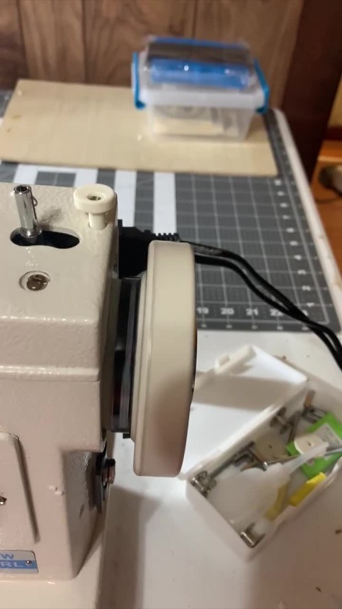 Consew CP206RL with covers opened during a customer inspection