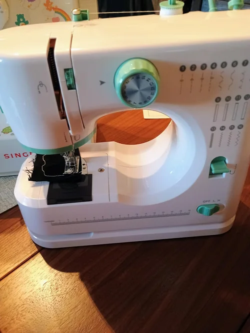 Marvik Forge mint-accented machine with visible bobbin cover