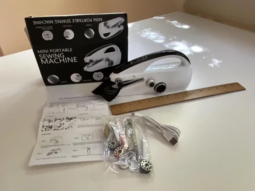 Customer photo of the Marirao handheld with cable, instructions and small tools