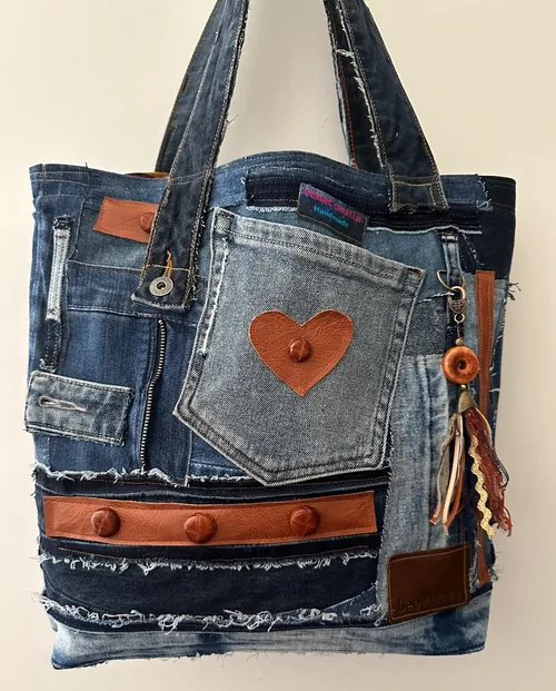 An owner’s finished denim bag, shared in their account of sewing bags with the 9960.