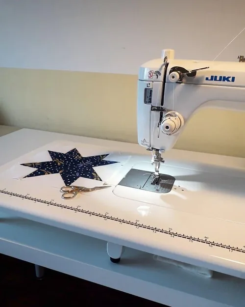 A TL-2010Q installed in an owner’s sewing table; the table is not the standard machine package.