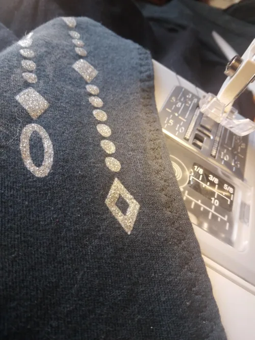 The altered T-shirt seam described by this MOD-15 owner.