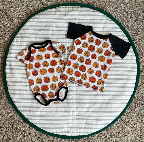 Baby garments made by an owner using the MX231 for knit projects.