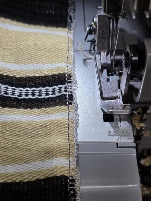 Fabric and stitching photographed by that same owner.