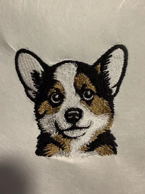 A dog embroidery project shared by another EOC06 owner.