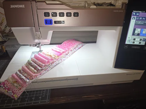 A 9410QC owner’s sewing setup.