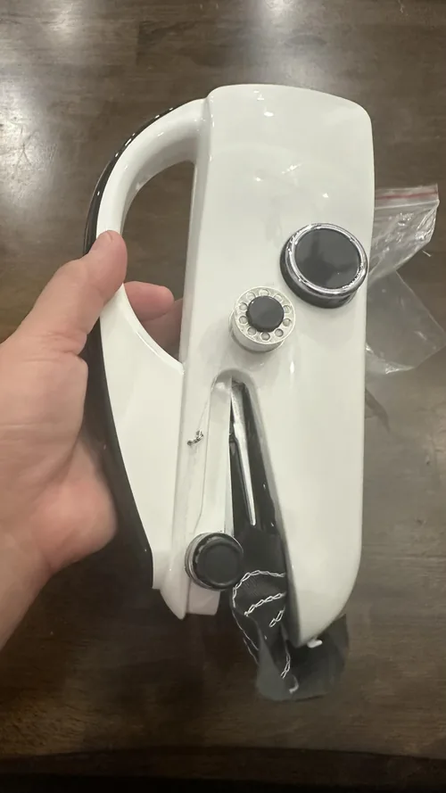 The Ninonly handheld tool photographed in an owner’s hand.